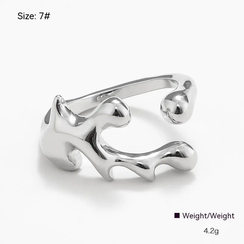 Silver open ring on a white background