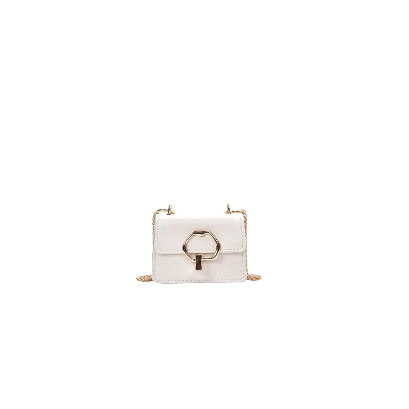 White handbag with a gold chain strap on a white background