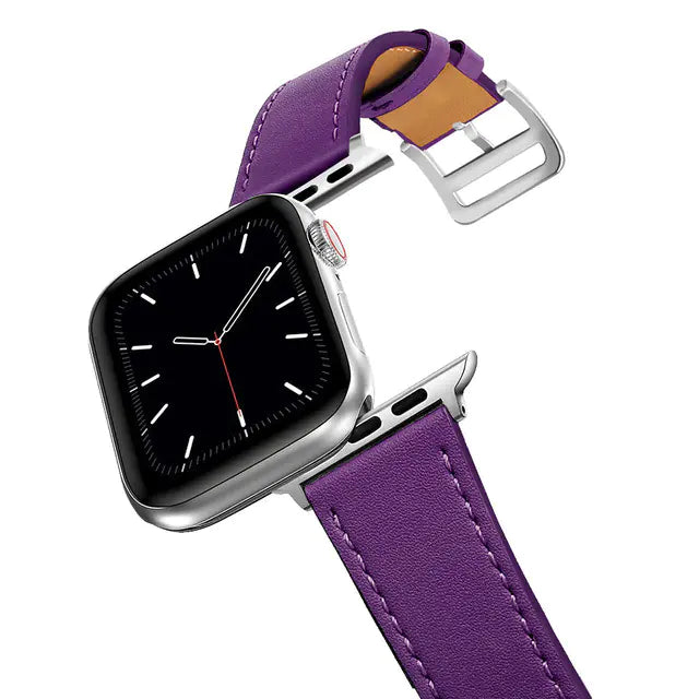Smartwatch with a purple leather strap on a white background
