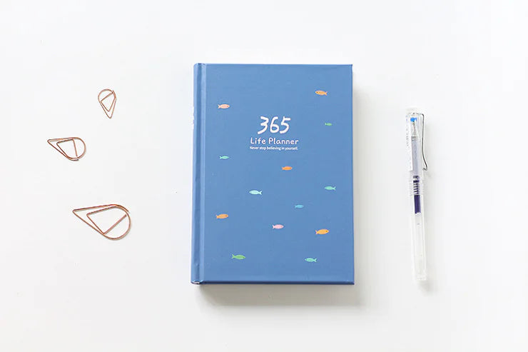 Blue planner with '365 Life Planner' text on a white background