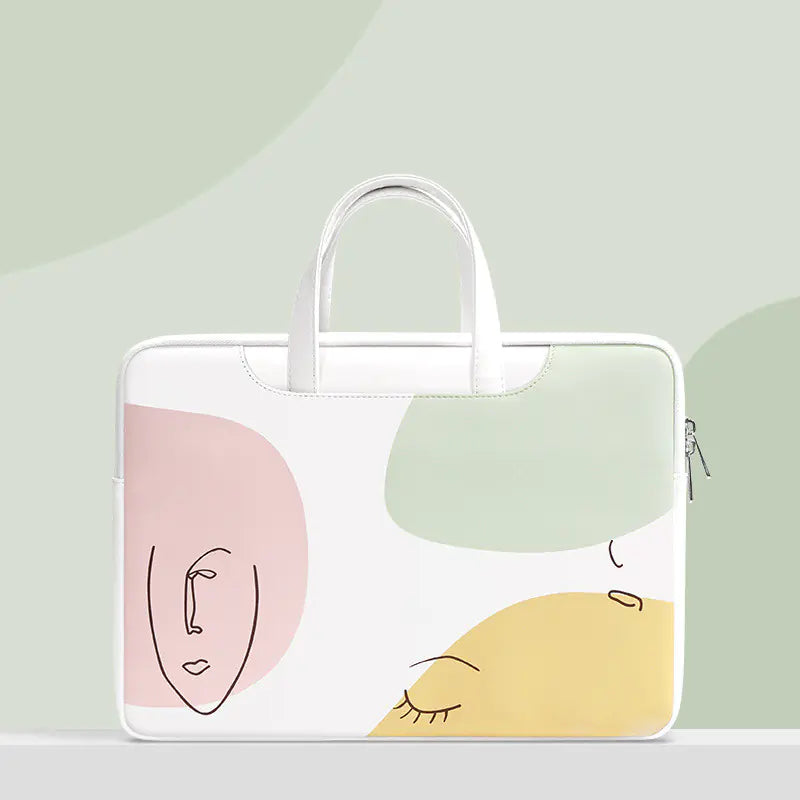 White tote bag with abstract face design on a light green background