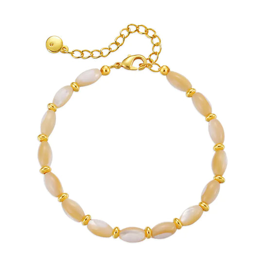 Beige shell-pearl bracelet with 18K gold clasp displayed on white background