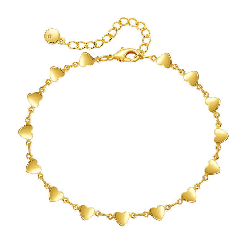 18K gold-plated heart-link chain bracelet displayed on a neutral white background.